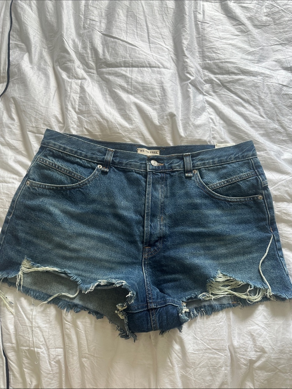 We The Free Distressed Dark Blue Denim Cutoff Shorts